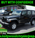 jeep wrangler unlimited 2010 black suv sport gasoline 6 cylinders 4 wheel drive automatic 33021