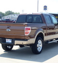 ford f 150 2011 brown lariat gasoline 6 cylinders 4 wheel drive automatic 62708
