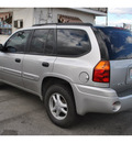 gmc envoy 2004 tan suv gasoline 6 cylinders 4 wheel drive 4 speed automatic 98901