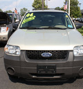 ford escape 2006 sand suv xls gasoline 4 cylinders front wheel drive automatic with overdrive 07702
