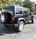 jeep wrangler unlimited 2011 black suv rubic gasoline 6 cylinders 4 wheel drive automatic with overdrive 08844