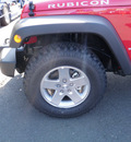 jeep wrangler 2011 red suv rubicon gasoline 6 cylinders 4 wheel drive 6 speed manual 08844