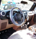 jeep wrangler unlimited 2011 green suv sahara gasoline 6 cylinders 4 wheel drive 6 speed manual 08844