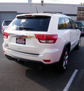 jeep grand cherokee 2011 white suv overland gasoline 8 cylinders 4 wheel drive automatic with overdrive 08844