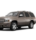 chevrolet tahoe 2011 brown suv lt flex fuel 8 cylinders 4 wheel drive automatic with overdrive 55391