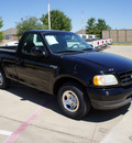 ford f 150 2002 black pickup truck xl sport gasoline 6 cylinders rear wheel drive 5 speed manual 76108