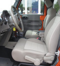 jeep wrangler 2010 orange suv sport mountain edition gasoline 6 cylinders 4 wheel drive automatic with overdrive 08844