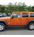 jeep wrangler unlimited 2011 orange suv sport gasoline 6 cylinders 4 wheel drive automatic 08844