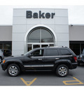 jeep grand cherokee 2009 black suv overland gasoline 8 cylinders 4 wheel drive automatic with overdrive 08844