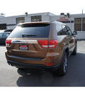 jeep grand cherokee 2011 brown suv 70th anniversary gasoline 8 cylinders 4 wheel drive automatic with overdrive 08844