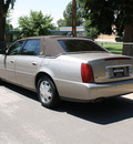 cadillac deville 2004 beige sedan gasoline 8 cylinders front wheel drive automatic 80110