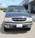 ford explorer 1999 blue suv xlt gasoline 6 cylinders 4 wheel drive automatic with overdrive 99301