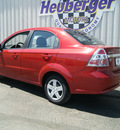 chevrolet aveo 2011 red sedan lt gasoline 4 cylinders front wheel drive automatic 80905