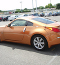 nissan 350z 2003 amber coupe touring gasoline 6 cylinders rear wheel drive automatic 99301