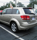 dodge journey 2009 tan suv sxt gasoline 6 cylinders all whee drive automatic 32447