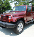 jeep wrangler unlimited 2007 red suv sahara 4x4 gasoline 6 cylinders 4 wheel drive automatic 27616