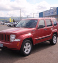jeep liberty 2009 red suv sport gasoline 6 cylinders 4 wheel drive automatic 98632
