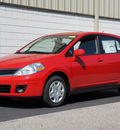 nissan versa 2011 red hatchback 1 8 s gasoline 4 cylinders front wheel drive 4 speed automatic 47130