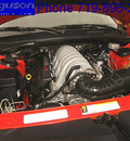 dodge challenger 2009 orange coupe srt8 gasoline 8 cylinders rear wheel drive auto 5 spd 80910