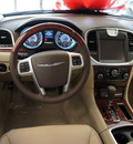 chrysler 300 2011 prp deep cherry red sedan gasoline 8 cylinders rear wheel drive automatic 33021