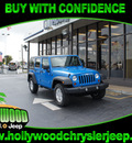jeep wrangler unlimited 2011 pb4 cosmo blue suv gasoline 6 cylinders 4 wheel drive automatic 33021