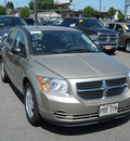 dodge caliber 2009 gold wagon sxt gasoline 4 cylinders front wheel drive cont  variable trans  99212