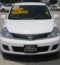 nissan versa 2011 white hatchback s gasoline 4 cylinders front wheel drive automatic 33884