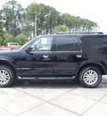 ford expedition 2011 black suv xlt flex fuel 8 cylinders 2 wheel drive automatic 32401
