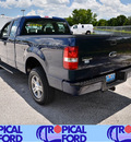 ford f 150 2008 blue stx gasoline 8 cylinders 4 wheel drive automatic 32837