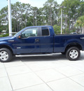 ford f 150 2011 blue xlt gasoline 6 cylinders 4 wheel drive automatic 32401
