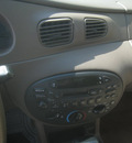 ford escort 1999 tan sedan se gasoline 4 cylinders front wheel drive automatic 55016