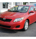 toyota corolla 2009 red sedan le gasoline 4 cylinders front wheel drive not specified 28677