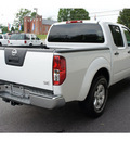 nissan frontier 2010 white se gasoline 6 cylinders 2 wheel drive not specified 28677
