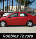 toyota corolla 2010 red sedan le gasoline 4 cylinders front wheel drive automatic 75503