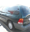 ford windstar 2001 green van gasoline 6 cylinders front wheel drive 4 speed automatic 43228