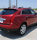 cadillac srx 2011 red gasoline 6 cylinders all whee drive automatic 76087