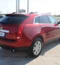 cadillac srx 2011 red gasoline 6 cylinders all whee drive automatic 76087