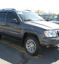 jeep grand cherokee 2004 gray suv limited gasoline 6 cylinders 4 wheel drive automatic with overdrive 13502