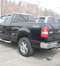 ford f 150 2006 black gasoline 8 cylinders 4 wheel drive automatic with overdrive 13502