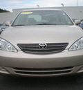 toyota camry 2004 tan sedan gasoline 4 cylinders front wheel drive automatic with overdrive 13502