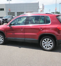 volkswagen tiguan 2009 red suv se 4 motion awd gasoline 4 cylinders all whee drive automatic 56001