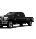 ford f 250 super duty 2011 black 4wd crew cab 156 lariat biodiesel 8 cylinders 4 wheel drive shiftable automatic 56301