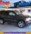chevrolet tahoe 2011 dk  gray suv ltz dvd navi flex fuel 8 cylinders 4 wheel drive automatic with overdrive 55391
