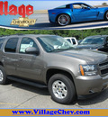 chevrolet tahoe 2011 beige suv lt flex fuel 8 cylinders 4 wheel drive automatic with overdrive 55391