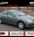 toyota camry 2009 green sedan le gasoline 4 cylinders front wheel drive automatic 55448