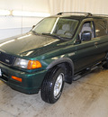 mitsubishi montero sport 1999 green suv ls gasoline v6 4 wheel drive automatic 44060