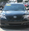 toyota camry 2009 black sedan le gasoline 4 cylinders front wheel drive automatic 33884