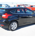 ford focus 2012 black hatchback sel gasoline 4 cylinders front wheel drive 6 speed automatic 77388