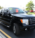ford f 150 2009 black stx gasoline 8 cylinders 4 wheel drive automatic with overdrive 07735