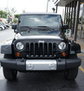 jeep wrangler unlimited 2011 px8 black clear coa suv 70th anniversary gasoline 6 cylinders 4 wheel drive automatic 33021